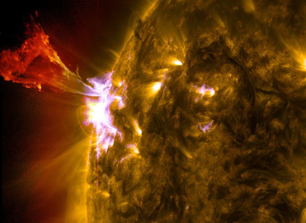 bright solar flare erupting from the sun surface