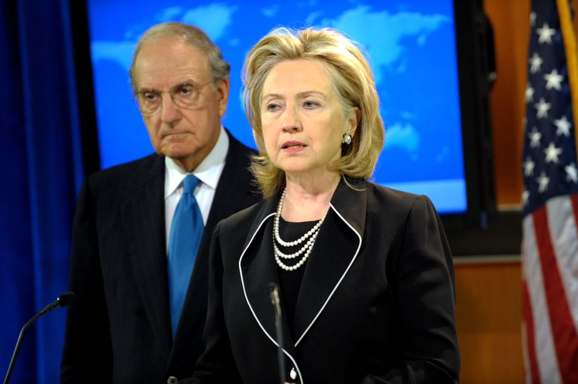 A Middle Eastern city skyline at dusk with minarets and modern towers