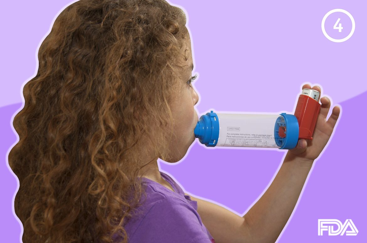 Asthma attacks research: a child using an inhaler at home